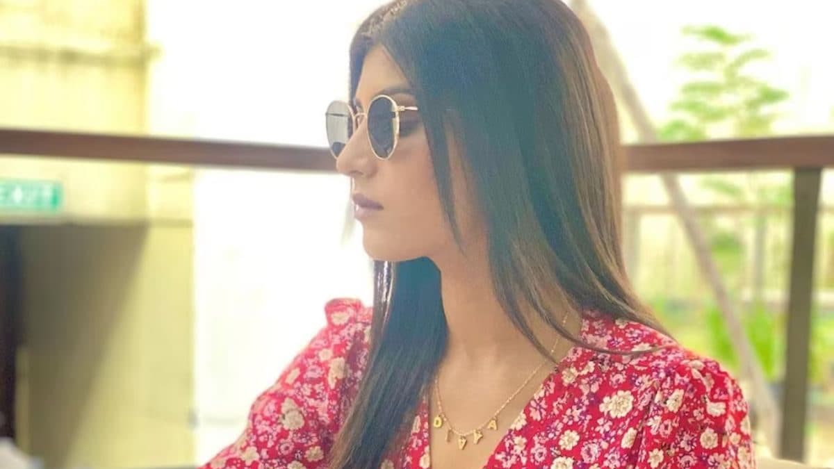 Actress Divya Suresh Slays In A Red And White Floral Printed Dress, See Pics