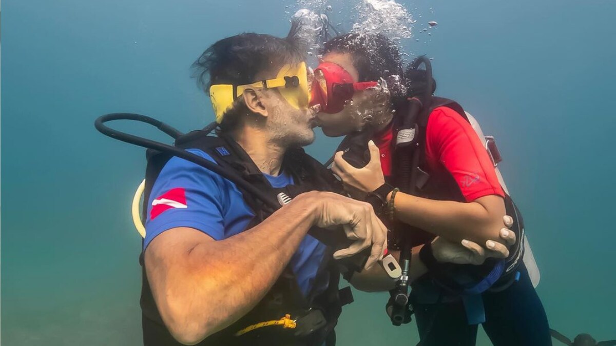 Milind Soman And Ankita Konwar Paint Instagram Red With An Underwater Kiss - Vimarsana News