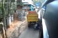 Kerala: Two Students Escape Unhurt After Scooter Gets Stuck Between Bus And Truck | WATCH