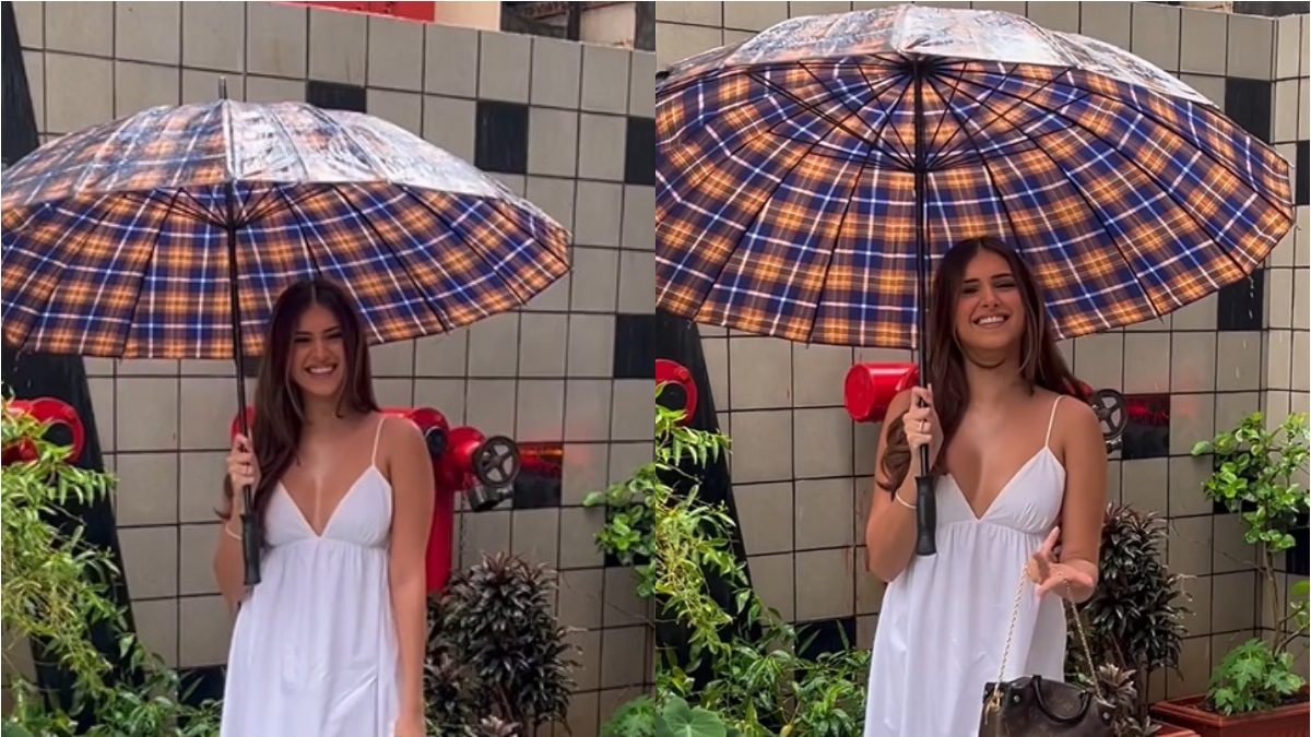 Tara Sutaria Steps Out In White Midi Dress And Checkered Umbrella