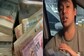 Watch: Malaysian Singer 'Shows Off' Bundles Of Currency Notes Kept Inside Fridge