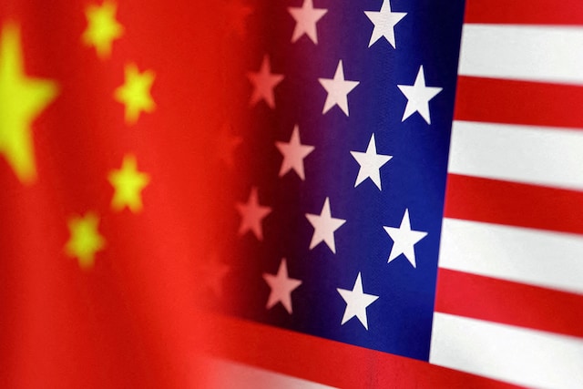 FILE PHOTO: U.S. and Chinese flags are seen in this illustration taken, January 30, 2023. REUTERS/Dado Ruvic/Illustration