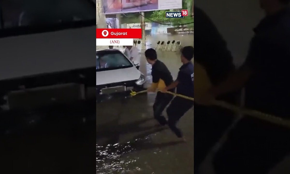Gujarat News Rain Creates Havoc In Gujarat, Four Rescued From A Car