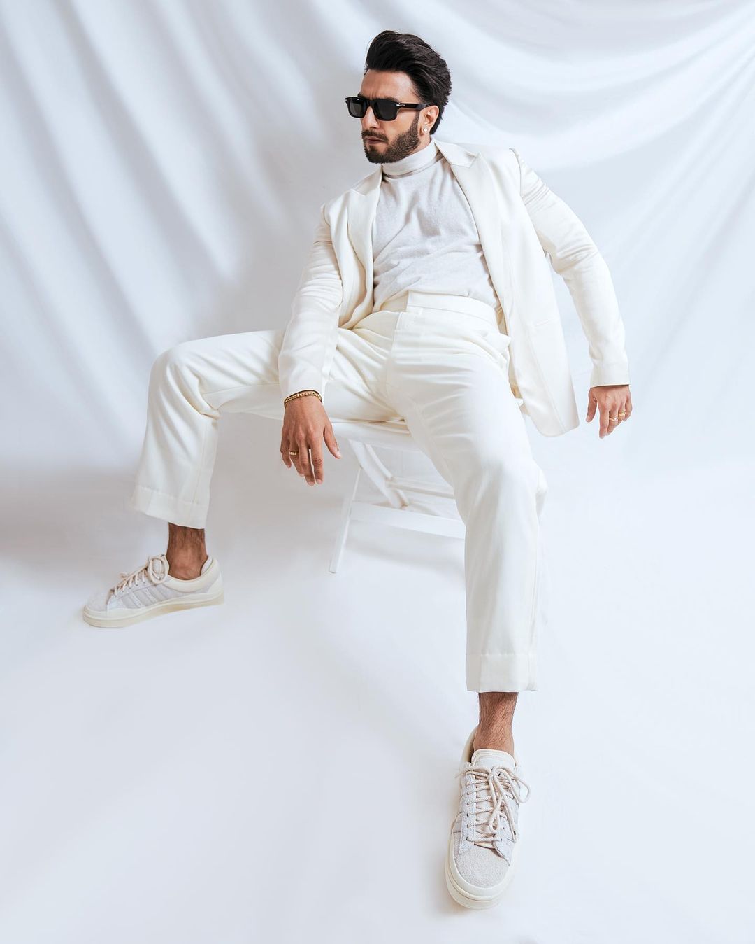  The actor accessorised his look with a pair of white sneakers, black shades and diamond studs. (Image: Instagram)