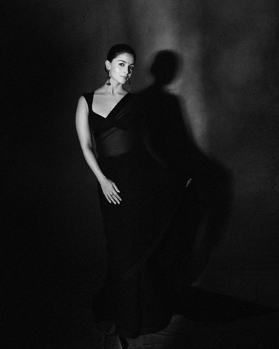  Alia looked absolutely stunning in this Manish Malhotra saree, styled by Ami Patel. We can't get enough of the beautiful silhouette! (Image: Instagram)