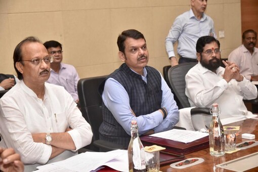 Maharashtra chief minister Eknath Shinde along with his deputies Devendra Fadnavis (C) and Ajit Pawar (L) during first cabinet meeting after the recent revolt. (News18)