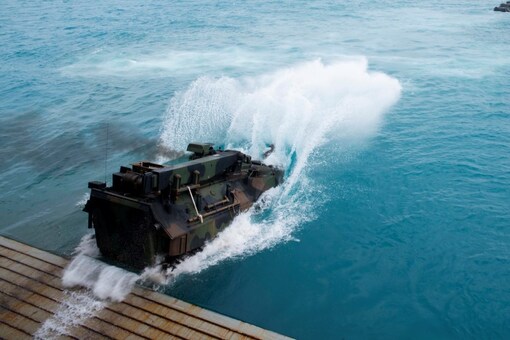 US Marines assault amphibious vehicles, depart the well deck of the amphibious transport dock ship USS Green Bay, during the Talisman Sabre, a US and Australian biennial training event. (Image: Reuters File)