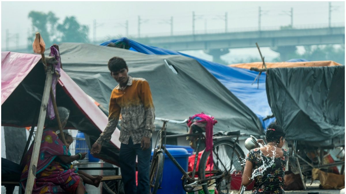 People Living Near Yamuna River in New Delhi Return Home as Waters Recede