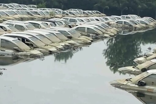 Delhi flood: Hundreds of cars in Greater Noida's Ecotech area continues to remain submerged even as the water level of Hindon river decreased. (ANI)