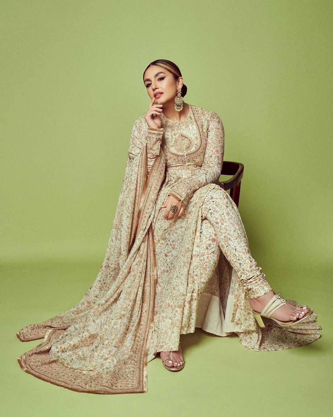 Huma Qureshi turned into a royal queen with an exquisite three-piece traditional stunner by Anamika Khanna. This outfit was pure regal magic, and her neat bun and traditional earrings added that extra dash of elegance. (Image: Instagram)