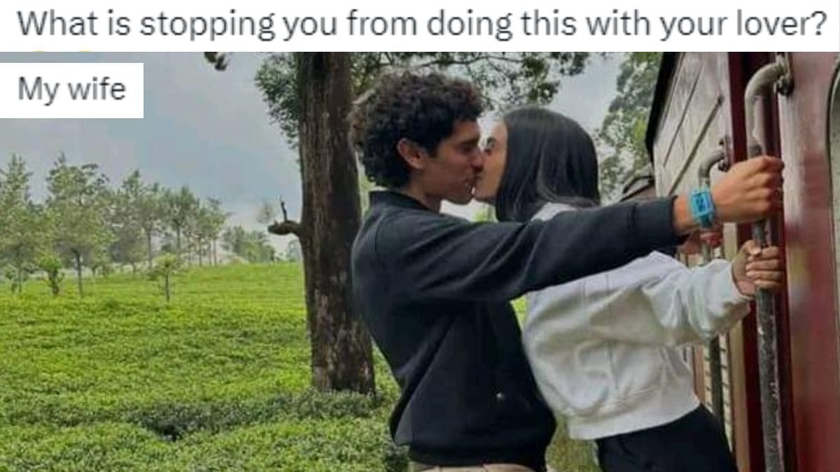'What's Stopping You?': Viral Pic of Couple Kissing While Hanging on Train Gets Hilarious Replies - Vimarsana News