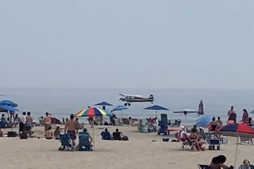 WATCH: US Plane Towing Banner Lands in Ocean off Crowded New Hampshire ...