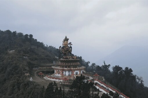 Sikkim: Visit attractions such as Tashiding Monastery, Dubdi Monastery, the Coronation Throne of Norbugane, Kartok Monastery, and more while indulging in shopping for unique and traditional trinkets.