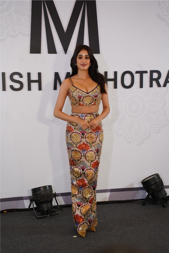 Janhvi Kapoor made a grand entrance, dressed in a stunning ensemble comprising a bralette top paired with a bodycon skirt that elegantly embraced her figure, beautifully highlighting her curves at the Manish Malhotra Bridal Couture show Janhvi Kapoor