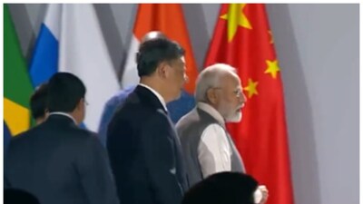 PM Modi Engages in Brief Talk with Chinese President Xi Jinping at ...