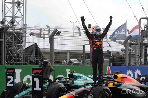 Red Bull driver Max Verstappen of the Netherlands celebrates after winning during the Formula One Dutch Grand Prix at the Zandvoort racetrack, in Zandvoort, Netherlands, Sunday, Aug. 27, 2023.(AP Photo/Peter Dejong)