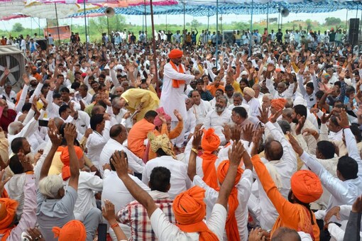 People attend a 'Mahapanchayat' called by Hindu outfits, at Pondri village in Palwal District on Sunday. (Image: PTI)