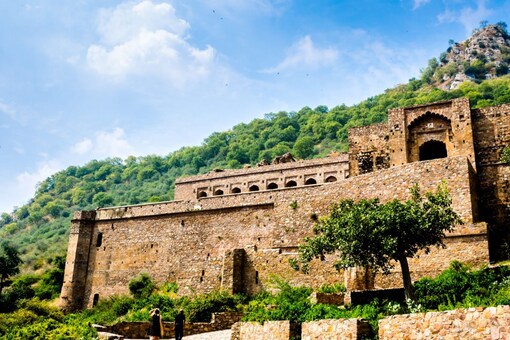 Nestled amidst the rugged terrain of Rajasthan, Bhangarh Fort is a place steeped in legends and eerie folklore