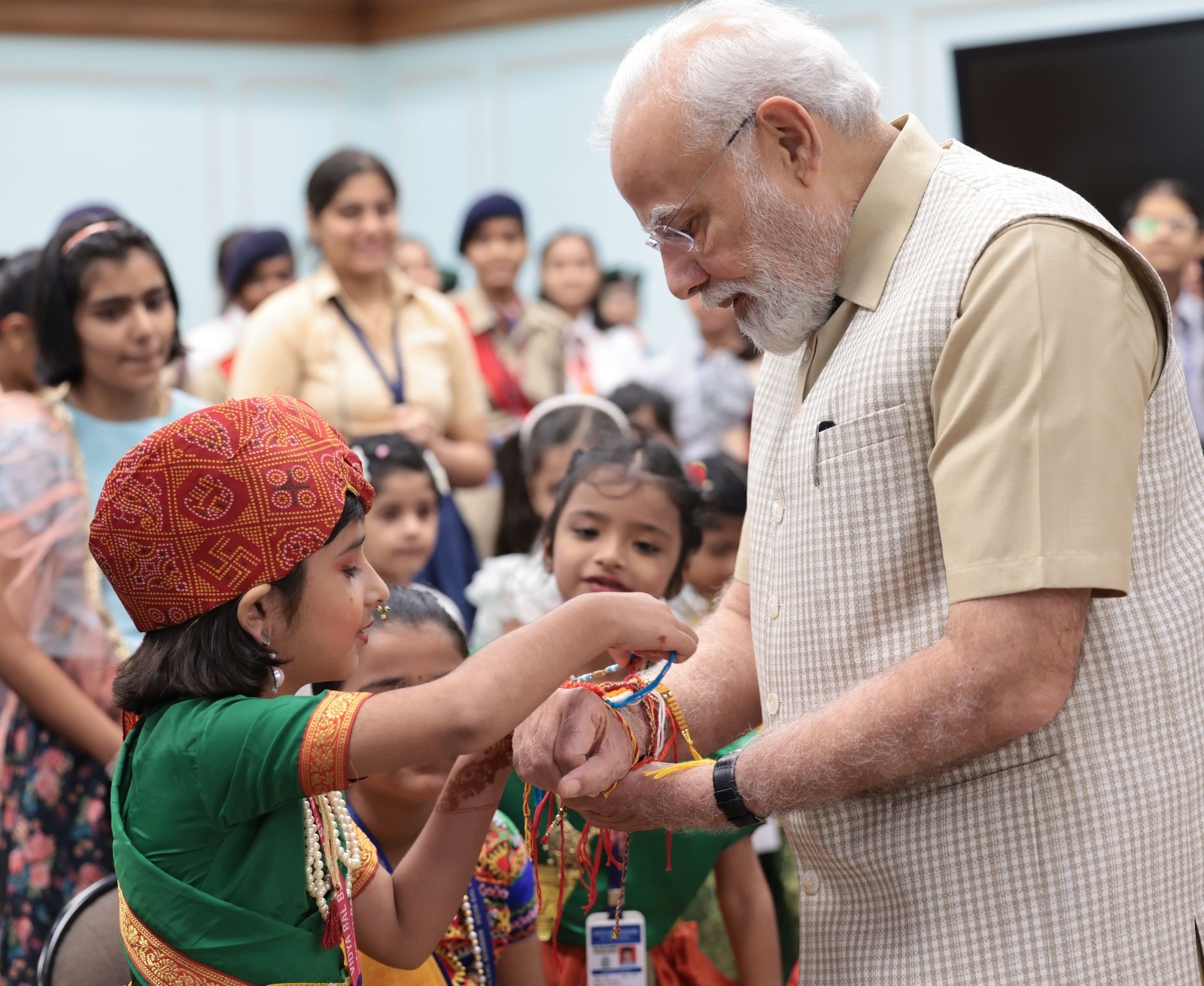 Modir Raksha PM Modi Greets People on Raksha Bandhan, Celebrates With School ...
