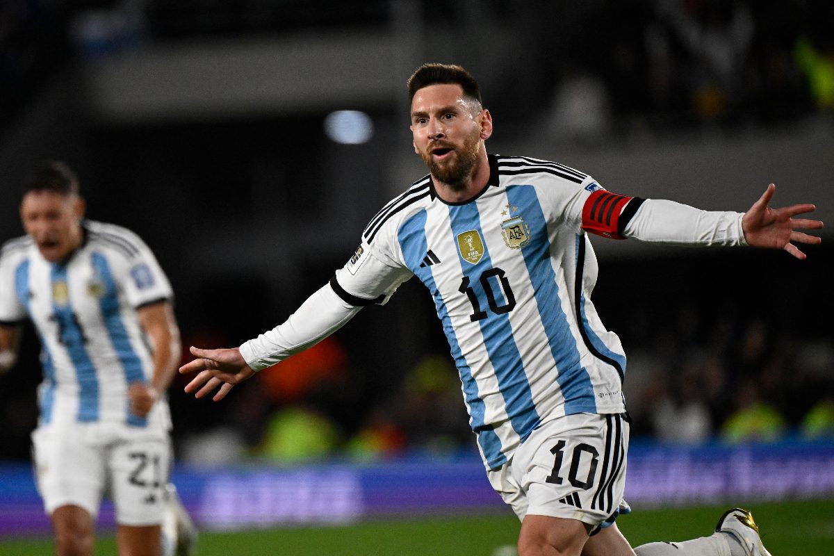 Lionel Messi celebrating after scoring from a sensational free-kick against Ecuador. (Credit: AFP)