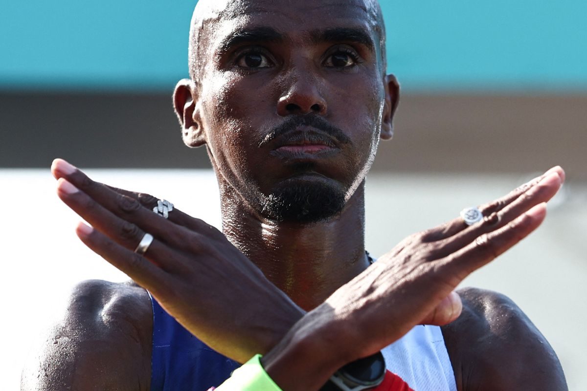 Fourth placed for the men's elite category Britain's Mo Farah reacts after crossing the finish line in 'The Big Half' half marathon in London, on September 3, 2023. - Big Half 2023 are British trials for World Athletics Road Running Championships Half Marathon. The start is close to Tower Bridge and finish at the Cutty Sark in Greenwich. (Photo: AFP)