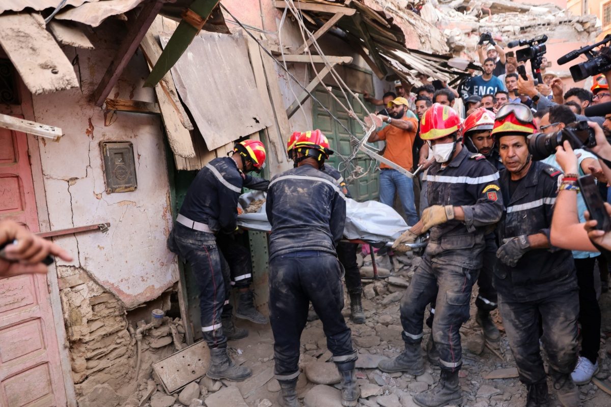 Emergency workers carry a dead body, in the aftermath of a deadly earthquake, in Amizmiz, Morocco. (Image: Reuters)