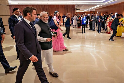 Prime Minister Narendra Modi with French President Emmanuel Macron during a lunch meeting on the sidelines of G20 Summit, in New Delhi. (Image: Reuters)