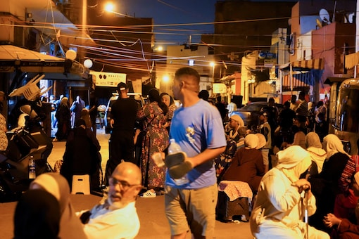 People gather on a street in Casablanca, following a powerful earthquake in Morocco, September 9, 2023. (Reuters)