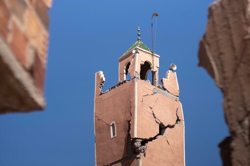 A cracked mosque minaret stands after an earthquake in Moulay Brahim village, near Marrakech, Morocco, Saturday, Sept. 9, 2023. (AP Photo)

