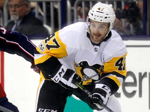 FILE - Pittsburgh Penguins forward Adam Johnson in action during an NHL hockey game in Columbus, Ohio, Friday, Sept. 22, 2017. American hockey player Adam Johnson has died after a “freak accident” during a game in England on Saturday, Oct. 28, 2023 his club said. The 29-year-old Minnesota native was playing for the Nottingham Panthers in a Challenge Cup game against the Sheffield Steelers when he suffered a slashed neck during the second period of the game at Sheffield’s Utilita Arena. (AP Photo/Paul Vernon, file)