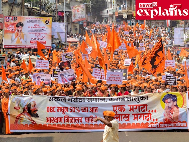 Activists of Maratha Kranti Morcha and Sakal Maratha Samaj during a protest march demanding Maratha reservation, in Karad. (Credits: PTI)