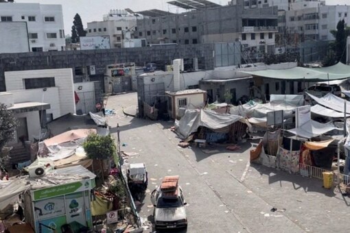 Tents and shelters used by displaced Palestinians stand at the yard of Al Shifa hospital during the Israeli ground operation around the hospital, in Gaza City. (Image: Reuters)