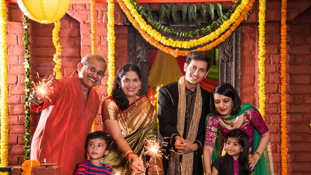 Image of Indian Family celebrating Diwali festival-YG564643-Picxy