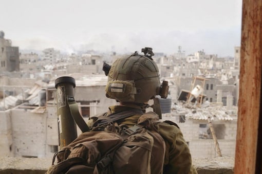 An Israeli soldier operates in the Gaza Strip, amid the ongoing ground operation of the Israeli army against the Palestinian Islamist group Hamas. (Image: Reuters)