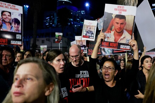 Protesters call for the immediate release of hostages held in Gaza who were seized from southern Israel on October 7 by Hamas gunmen during a deadly attack in Tel Aviv, Israel. (Image: Reuters)