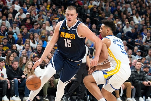 Nikola Jokic put up 35 points, 13 rebounds and 5 assists in the Nuggets' win. (Credit: AP)