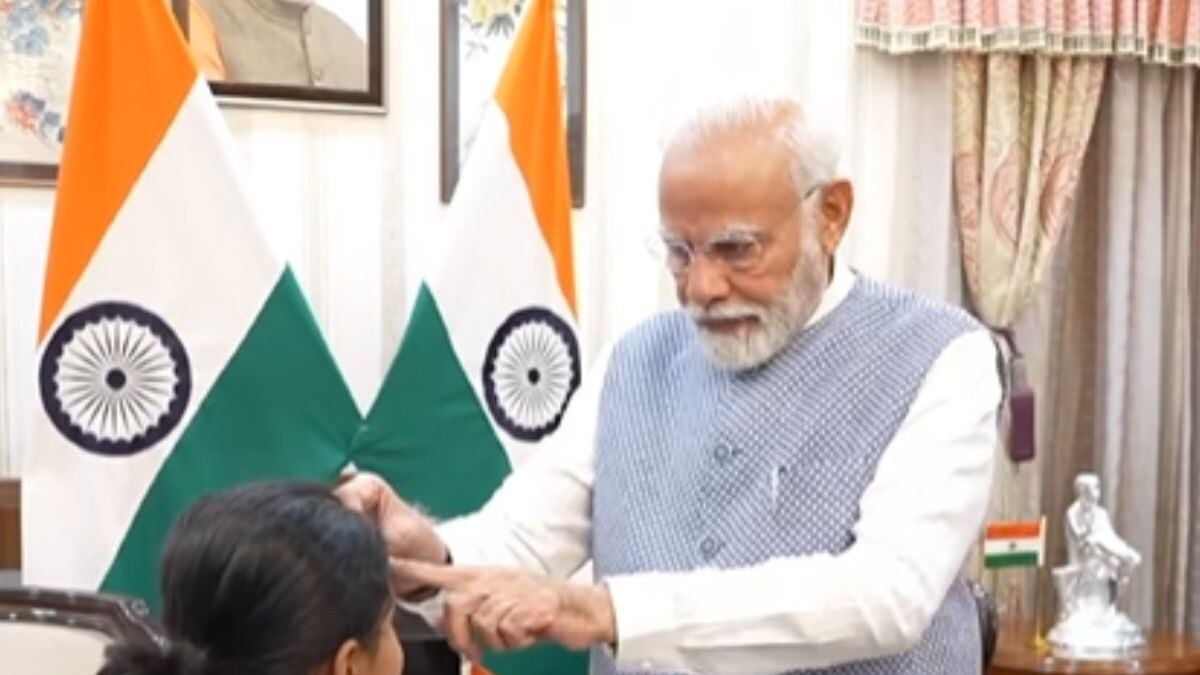 WATCH | PM Modi Exhibits Youngsters A Trick With Coin in Candid Video – News18