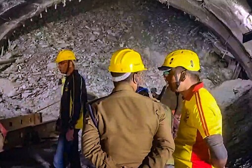 Rescue and relief operations underway after a portion of an under-construction tunnel collapsed in Uttarkashi district. (PTI)