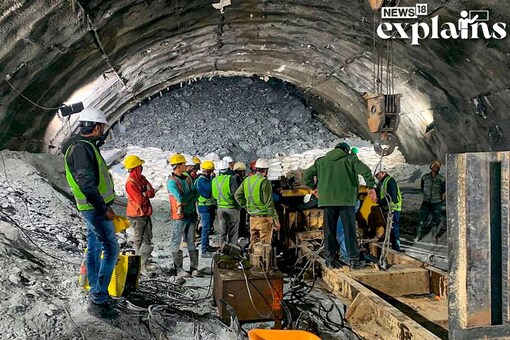 Rescue underway after a portion of a tunnel under construction between Silkyara and Dandalgaon collapsed in Uttarkashi district. (Credits: PTI)
