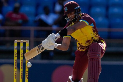 West Indies' Brandon King plays a shot against England during the second T20 cricket match at National Cricket Stadium in Saint George's, Grenada, Thursday, Dec. 14, 2023. (AP Photo/Ricardo Mazalan)