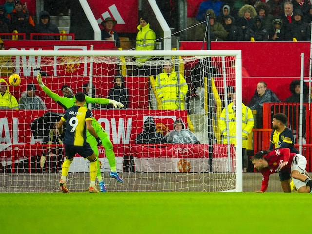 Bournemouth's Philip Billing, front right, scores his side's second goal during the English Premier League soccer match between Manchester United and Bournemouth at the Old Trafford stadium in Manchester, England, Saturday, Dec. 9, 2023. (AP Photo/Jon Super)