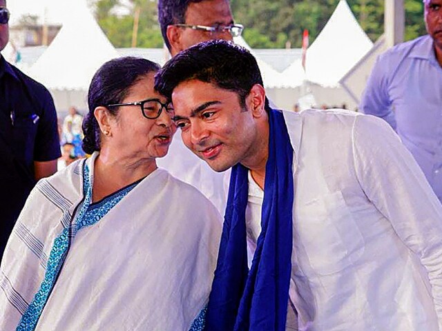 est Bengal Chief Minister Mamata Banerjee with her nephew and party General Secretary Abhishek Banerjee (Image: PTI File)