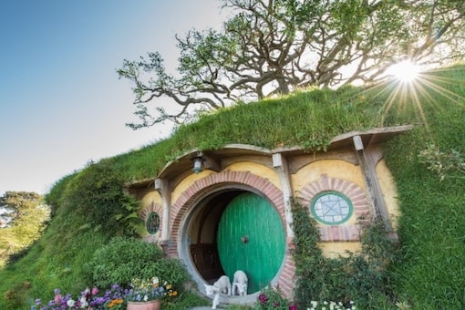 Start your journey at Hobbiton Movie Set. Here, you'll be transported to the Shire, a place so magical it's hard to believe it's real