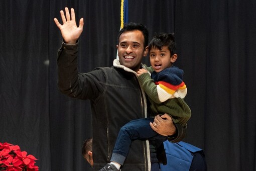 Republican presidential candidate and businessman Vivek Ramaswamy holds his son Karthik during the Faith and Family with the Feenstras event hosted by Rep. Randy Feenstra in Sioux Center, Iowa, US. (Image: Reuters)