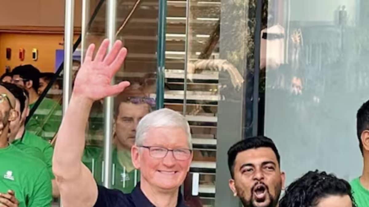 Tim Cook Waving Apple CEO Tim Cook Confirms ChatGPT-Like AI Features Coming To iPhones ...