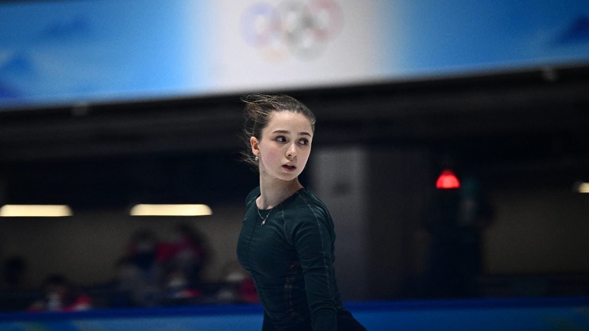 canada-and-russia-appeal-2022-olympic-team-figure-skating-podium