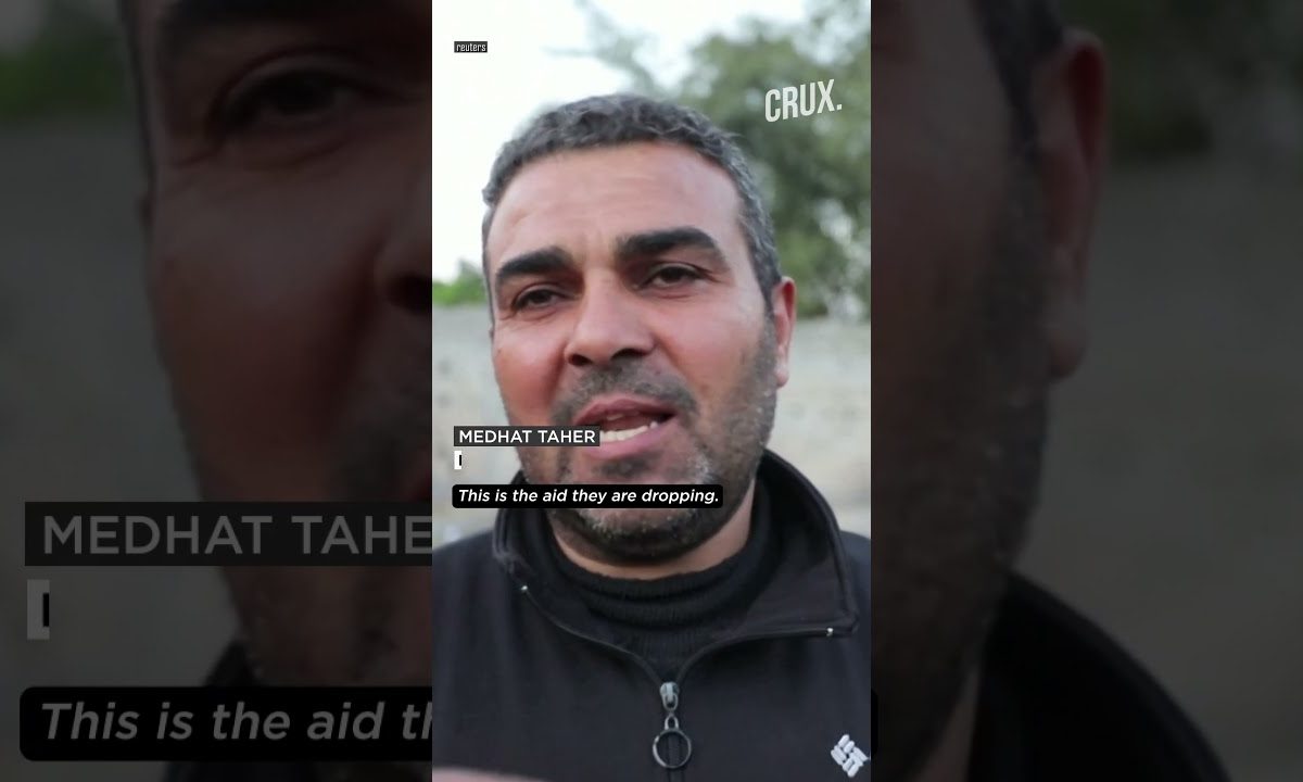 Gazans Climb Onto Aid Trucks For Bags Of Flour