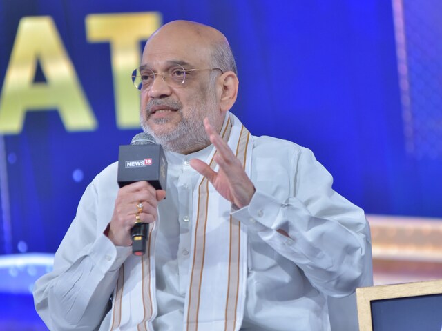 Union Home Minister and senior BJP leader Amit Shah at CNN-News18 Rising Bharat Summit on Wednesday. (News18)