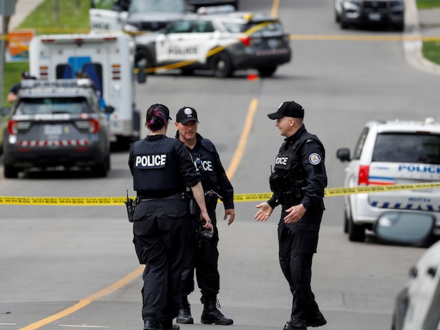 Police officers work at the scene in Toronto, Ontario, Canada, May 26, 2022. (Reuters File Photo)