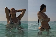 Sexy! Kim Kardashian Flaunts Cleavage As She Slips into Racy Bikini for Swim, Hot Photos Go Viral